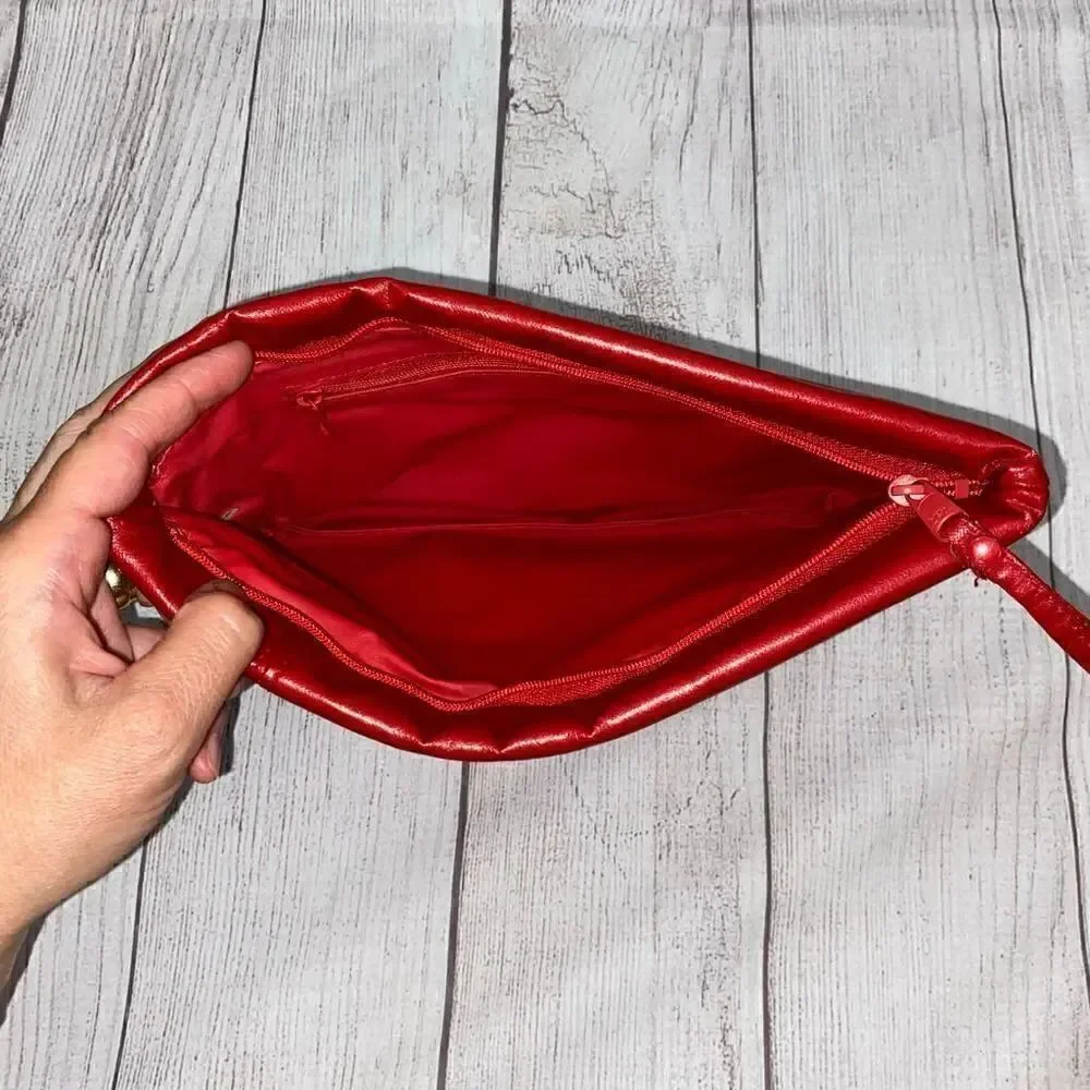 Clutch purse with wrist strap, zipper closure red